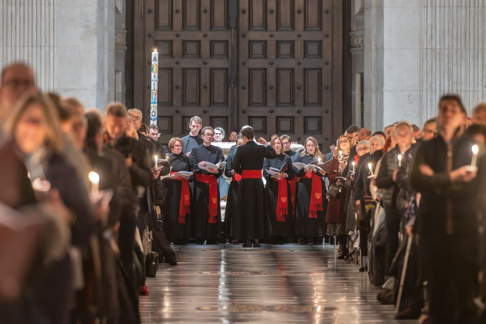 Choir and candlelit congregation at St Paul's Cathedral